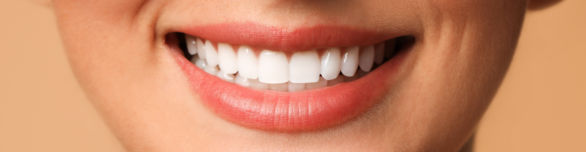 Close-up photo of woman's smile.